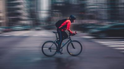 Cyclist speed bicycle 4k wallpaper