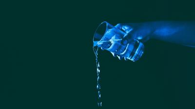 Glass hand water lighting 4k wallpaper