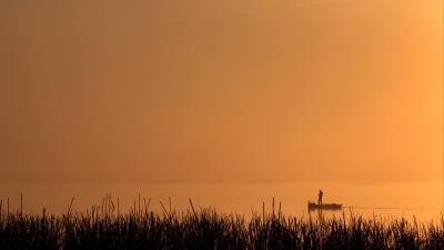 Silhouette boat lake 4k wallpaper