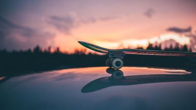 Skateboard sunset sky 4k wallpaper