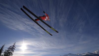 Skier ski jump fly sky sun mountain 4k wallpaper