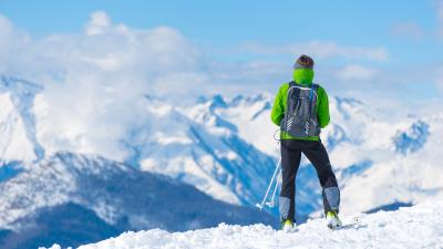 Sportsman skiing mountain top tourist 4k wallpaper