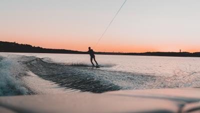 Surfer surfing water 4k wallpaper