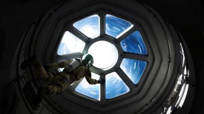 Astronaut porthole space 4k wallpaper