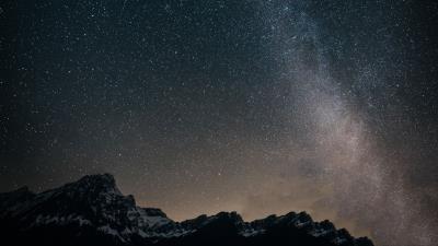 Starry sky mountains milky way 4k wallpaper