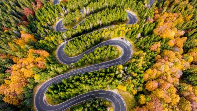 Winding road aerial view 4k wallpaper