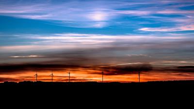 Windmills sunset skyline beautiful 4k wallpaper