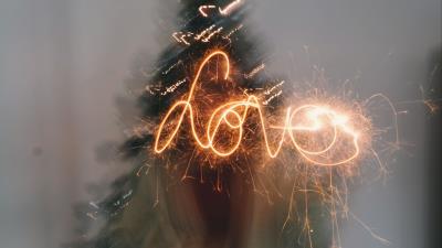 Love inscription glitter sparks 4k wallpaper