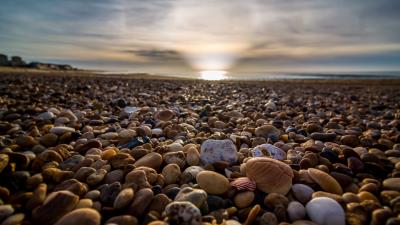 Beach pebbles sea 4k wallpaper