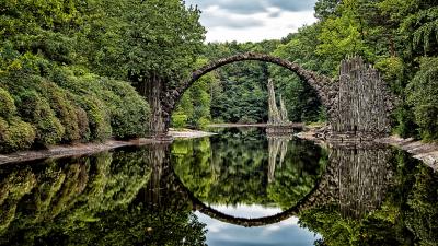 Bridge arch trees river reflection 4k wallpaper