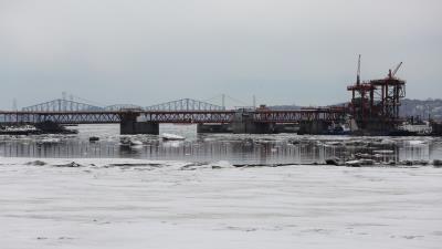 Bridge river buildings snow 4k wallpaper
