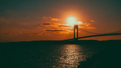 Bridge sunset sea 4k wallpaper