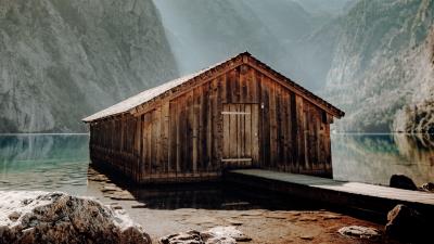 Building coast rocks 4k wallpaper