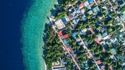 Buildings roofs island 4k wallpaper