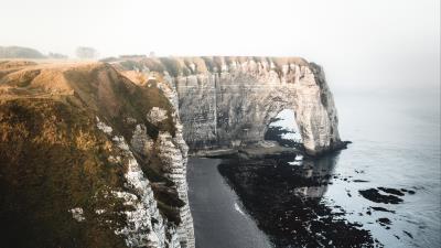 Cliff coast beach 4k wallpaper