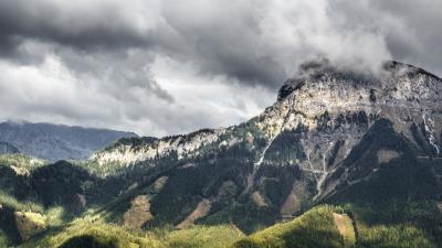 Cliff mountains grass sky wallpaper 4k wallpaper