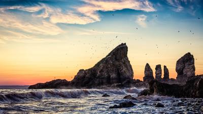 Cliff rock waves 4k wallpaper