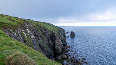 Cliff rocks sea image 4k wallpaper