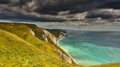 Coast cliff rocks 4k wallpaper