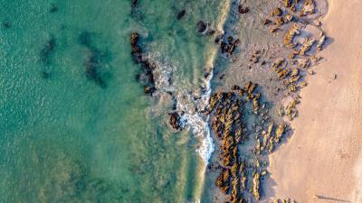 Coast rocks aerial view 4k wallpaper