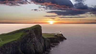 Crag sunset lighthouse 4k wallpaper
