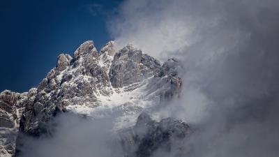 Fog rocks mountain 4k wallpaper