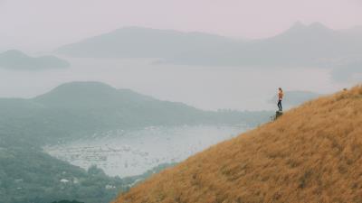 Hill girl view 4k wallpaper