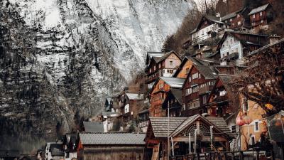 Houses mountains by the river 4k wallpaper