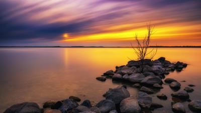 Lake stones sunset 4k wallpaper