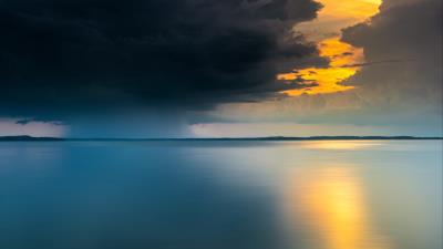 Lake sunset glare 4k wallpaper