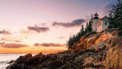 Lighthouse building rock 4k wallpaper