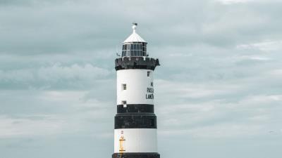 Lighthouse building sea image 4k wallpaper