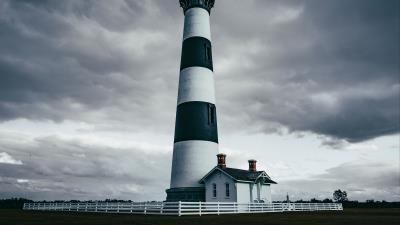 Lighthouse building sky fence 4k wallpaper