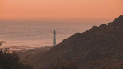 Lighthouse coast fog 4k wallpaper