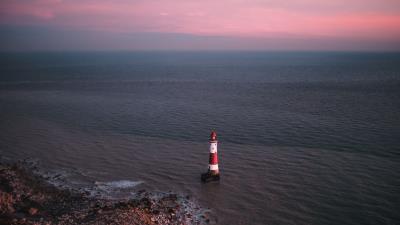 Lighthouse sea aerial view 4k wallpaper