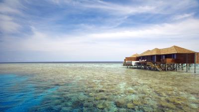 Maldives tropical bungalows 4k wallpaper