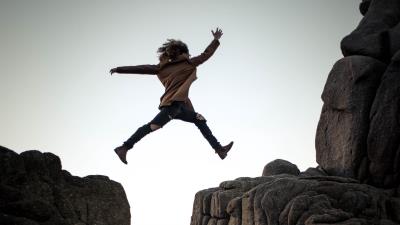 Man jump rocks 4k wallpaper