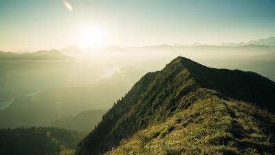 Mountain peak sunlight 4k wallpaper