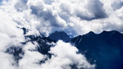 Mountains clouds high sky 4k wallpaper