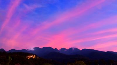 Mountains clouds village 4k wallpaper