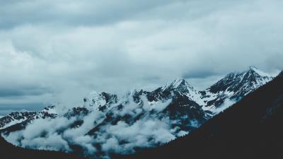 Mountains fog sky peaks snow covered 4k wallpaper