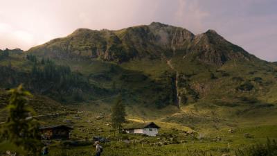 Mountains grass house 4k wallpaper