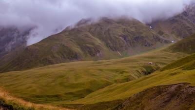 Mountains hills building 4k wallpaper