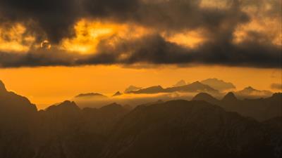 Mountains peaks clouds on 4k wallpaper