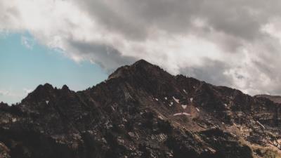 Mountains peaks clouds photo 4k wallpaper