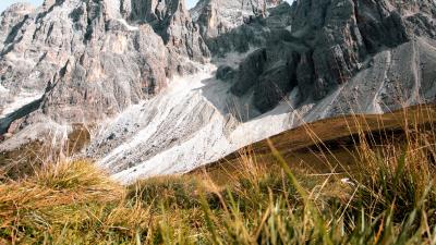 Mountains rocks lawn 4k wallpaper