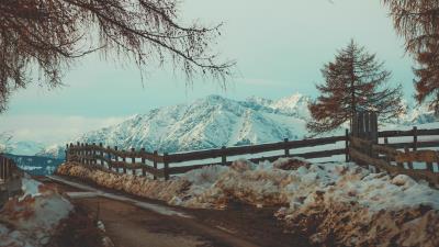 Mountains snow road 4k wallpaper