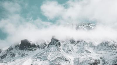 Mountains snowy clouds 4k wallpaper