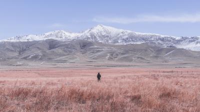Mountains steppe man 4k wallpaper