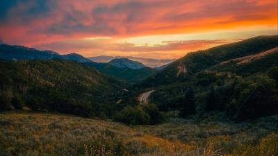 Mountains sunset lawn 4k wallpaper